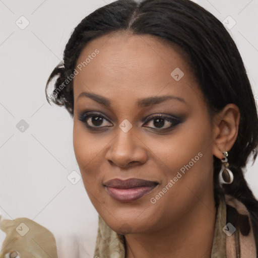 Joyful black young-adult female with long  brown hair and brown eyes