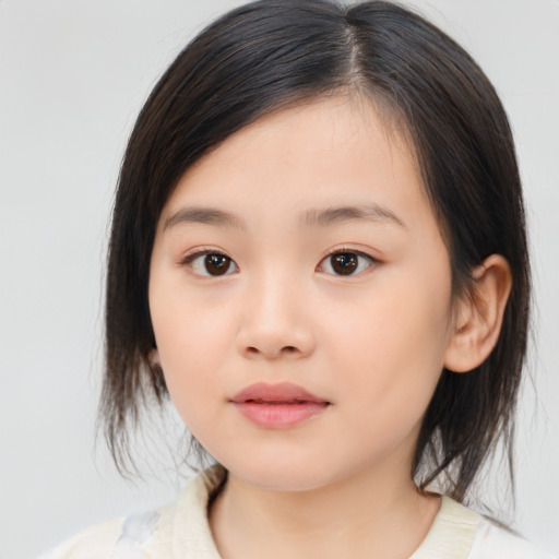 Neutral asian child female with medium  brown hair and brown eyes