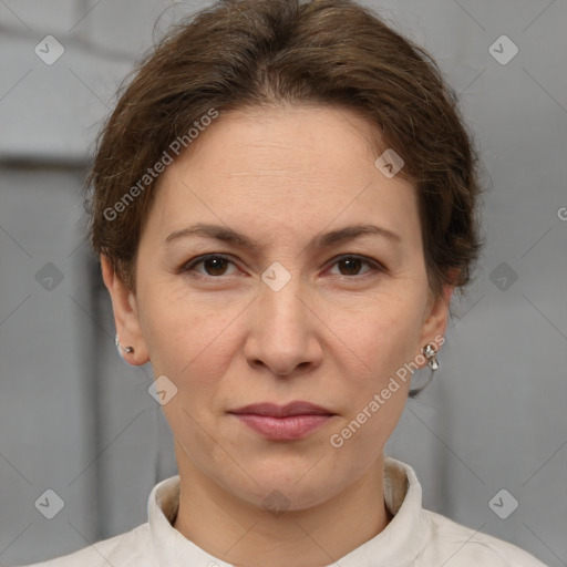 Joyful white adult female with short  brown hair and brown eyes