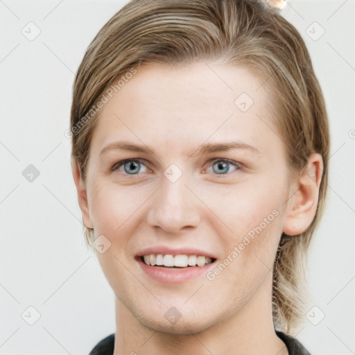 Joyful white young-adult female with short  brown hair and grey eyes