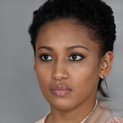Neutral latino young-adult female with short  brown hair and brown eyes