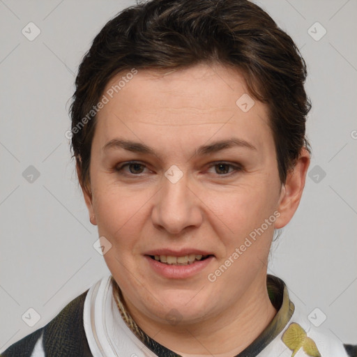 Joyful white adult female with short  brown hair and brown eyes