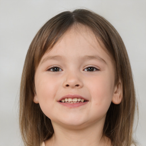 Joyful white child female with medium  brown hair and brown eyes