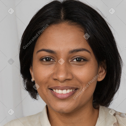 Joyful black young-adult female with medium  black hair and brown eyes