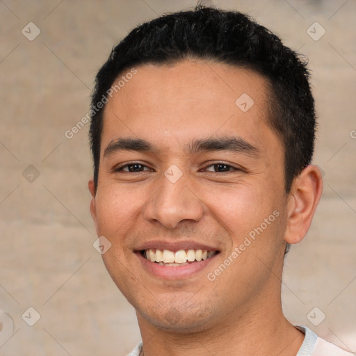 Joyful white young-adult male with short  black hair and brown eyes