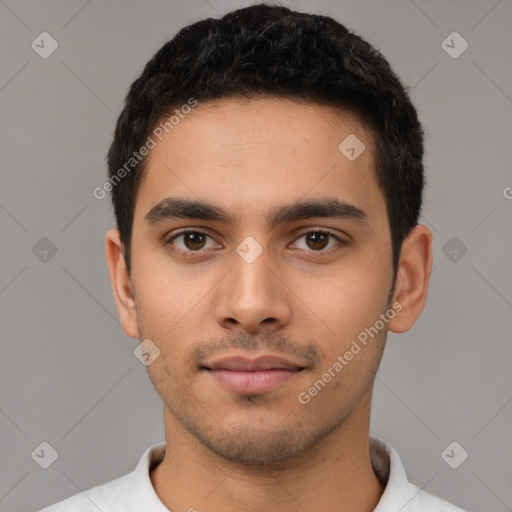 Neutral latino young-adult male with short  black hair and brown eyes