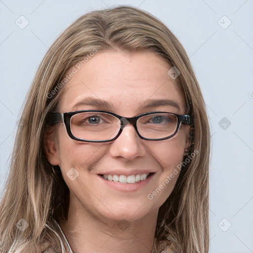 Joyful white young-adult female with long  brown hair and blue eyes