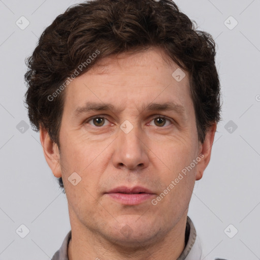 Neutral white adult male with short  brown hair and brown eyes