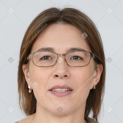 Joyful white adult female with medium  brown hair and brown eyes