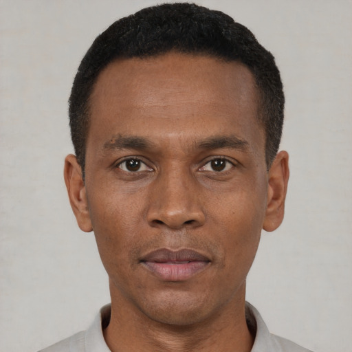 Neutral black adult male with short  black hair and brown eyes