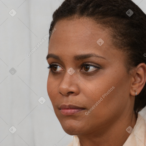 Neutral black young-adult female with short  brown hair and brown eyes