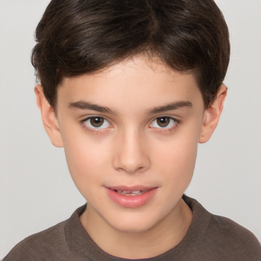 Joyful white child female with short  brown hair and brown eyes