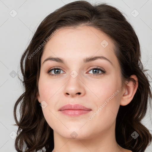 Joyful white young-adult female with medium  brown hair and green eyes