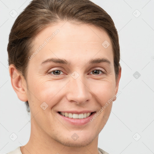 Joyful white young-adult female with short  brown hair and brown eyes