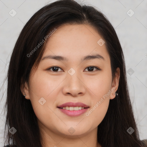 Joyful asian young-adult female with long  brown hair and brown eyes