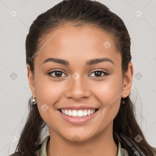 Joyful white young-adult female with long  brown hair and brown eyes