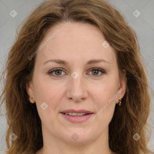 Joyful white adult female with long  brown hair and brown eyes