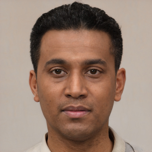 Neutral latino young-adult male with short  black hair and brown eyes