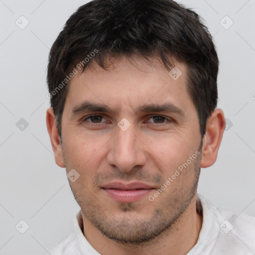 Joyful white young-adult male with short  brown hair and brown eyes