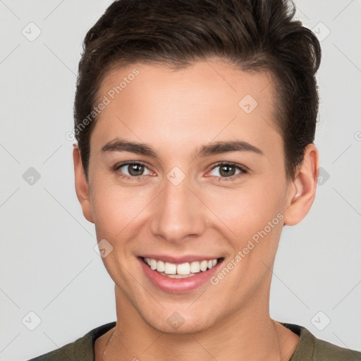 Joyful white young-adult female with short  brown hair and brown eyes