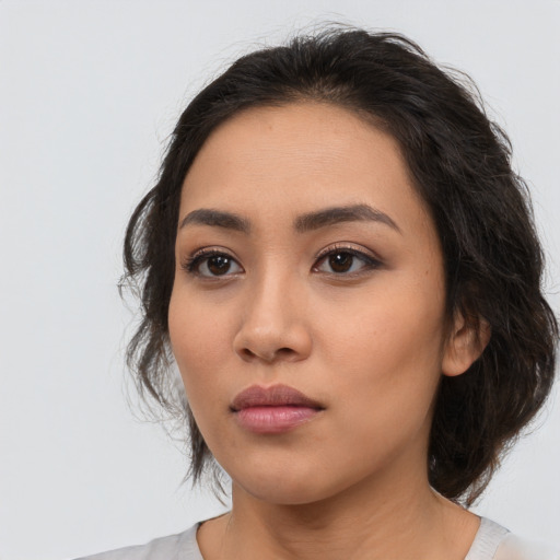 Neutral white young-adult female with medium  black hair and brown eyes