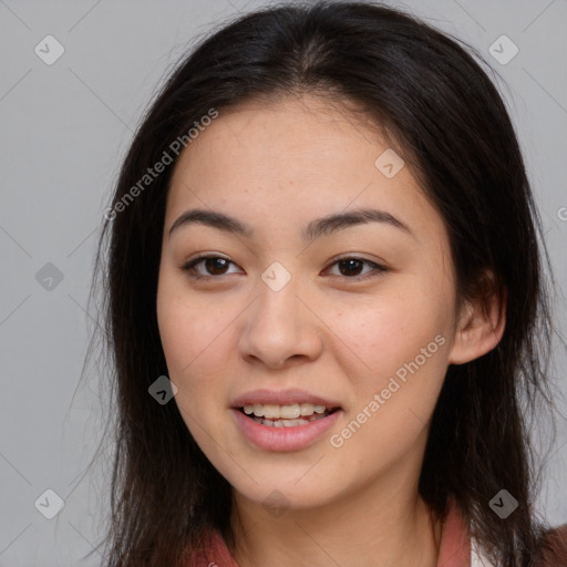 Joyful asian young-adult female with long  brown hair and brown eyes