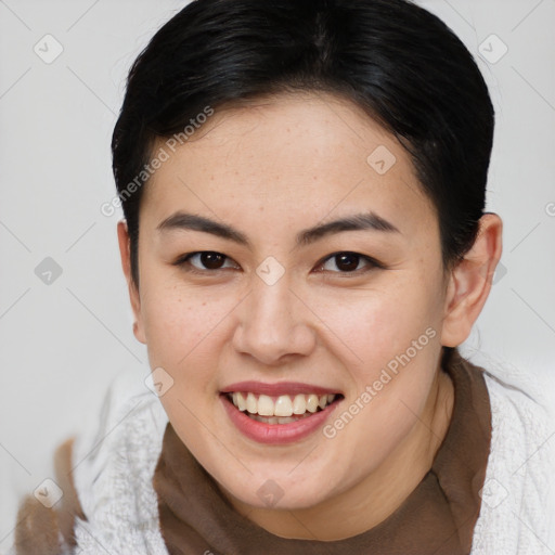 Joyful asian young-adult female with medium  brown hair and brown eyes