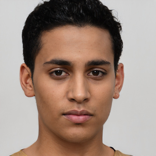 Neutral latino young-adult male with short  brown hair and brown eyes