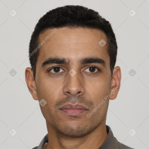 Neutral latino young-adult male with short  black hair and brown eyes