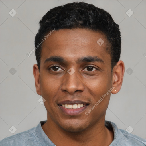 Joyful latino young-adult male with short  black hair and brown eyes