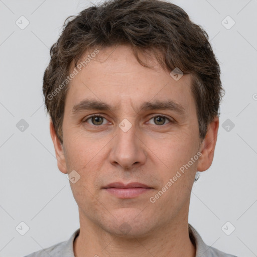 Neutral white adult male with short  brown hair and brown eyes