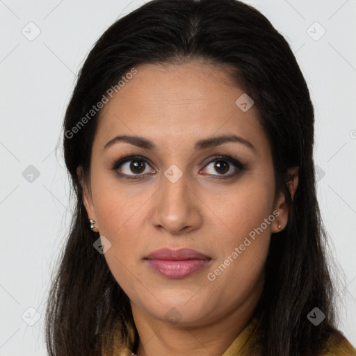 Joyful latino young-adult female with long  brown hair and brown eyes