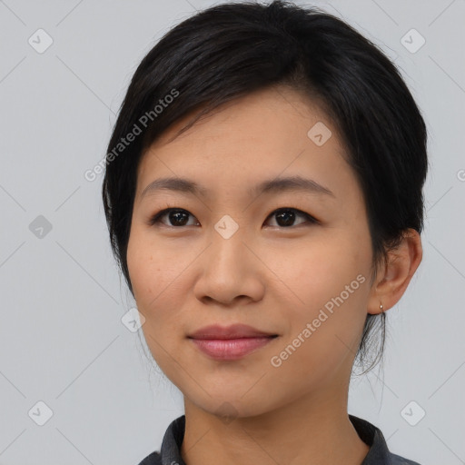 Joyful latino young-adult female with medium  black hair and brown eyes