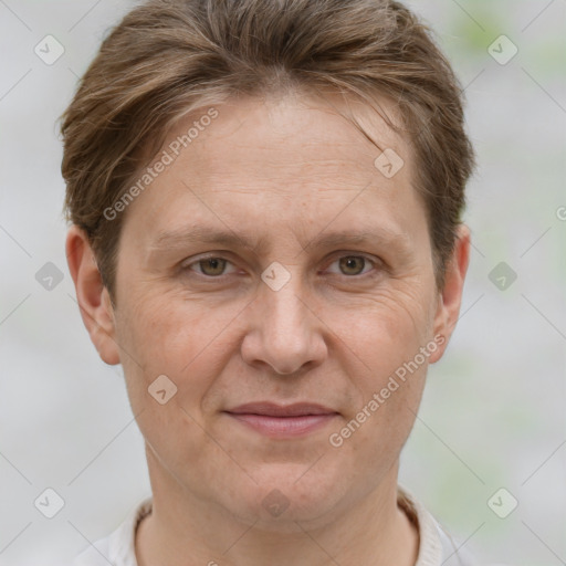 Joyful white adult female with short  brown hair and brown eyes