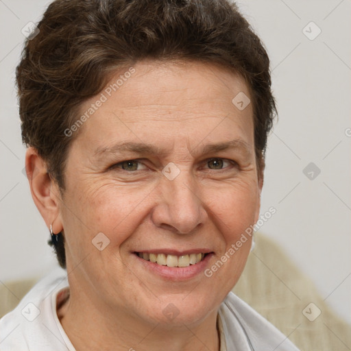 Joyful white adult female with short  brown hair and brown eyes