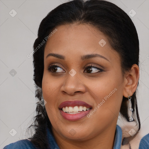 Joyful latino young-adult female with medium  brown hair and brown eyes