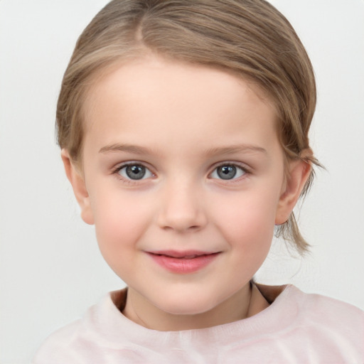 Joyful white child female with medium  brown hair and grey eyes