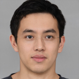 Neutral asian young-adult male with short  brown hair and brown eyes