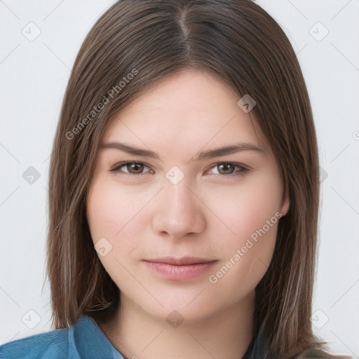 Neutral white young-adult female with long  brown hair and brown eyes