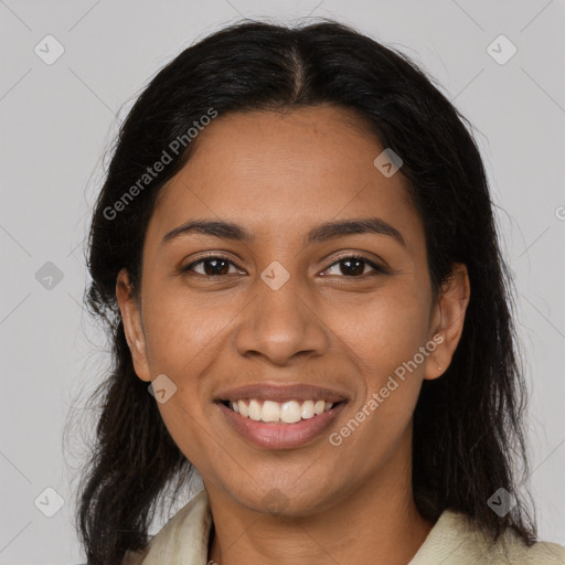 Joyful latino young-adult female with long  brown hair and brown eyes