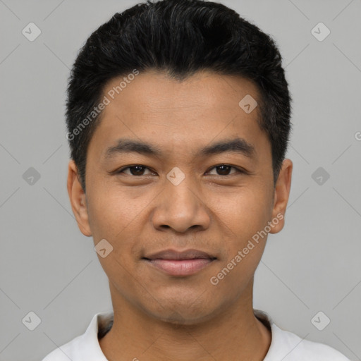 Joyful asian young-adult male with short  black hair and brown eyes