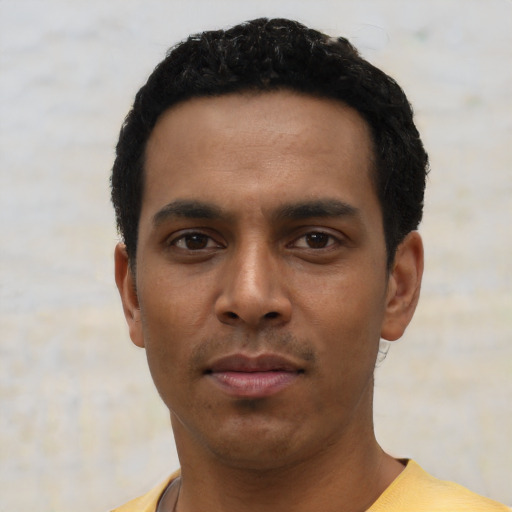 Neutral black young-adult male with short  black hair and brown eyes