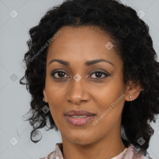 Joyful black young-adult female with medium  black hair and brown eyes