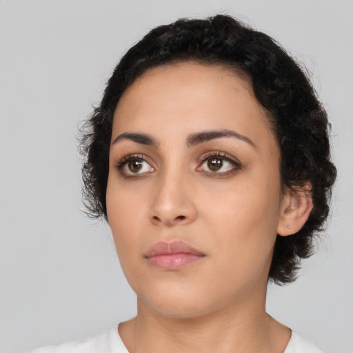Neutral latino young-adult female with medium  black hair and brown eyes