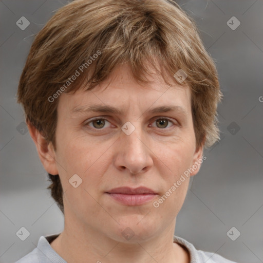 Joyful white adult male with short  brown hair and grey eyes