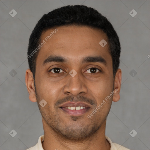 Joyful latino young-adult male with short  brown hair and brown eyes