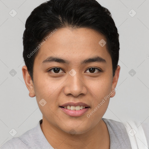 Joyful asian young-adult male with short  brown hair and brown eyes