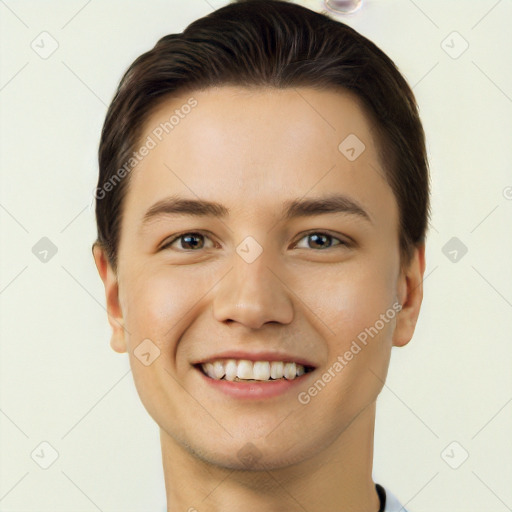 Joyful white young-adult male with short  brown hair and brown eyes