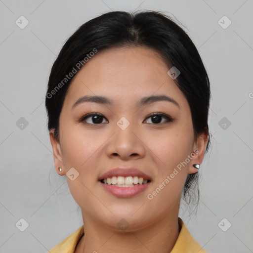 Joyful asian young-adult female with medium  black hair and brown eyes