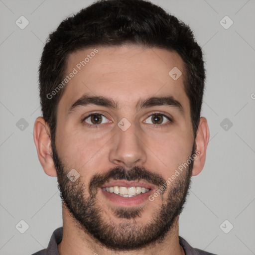 Joyful white young-adult male with short  black hair and brown eyes